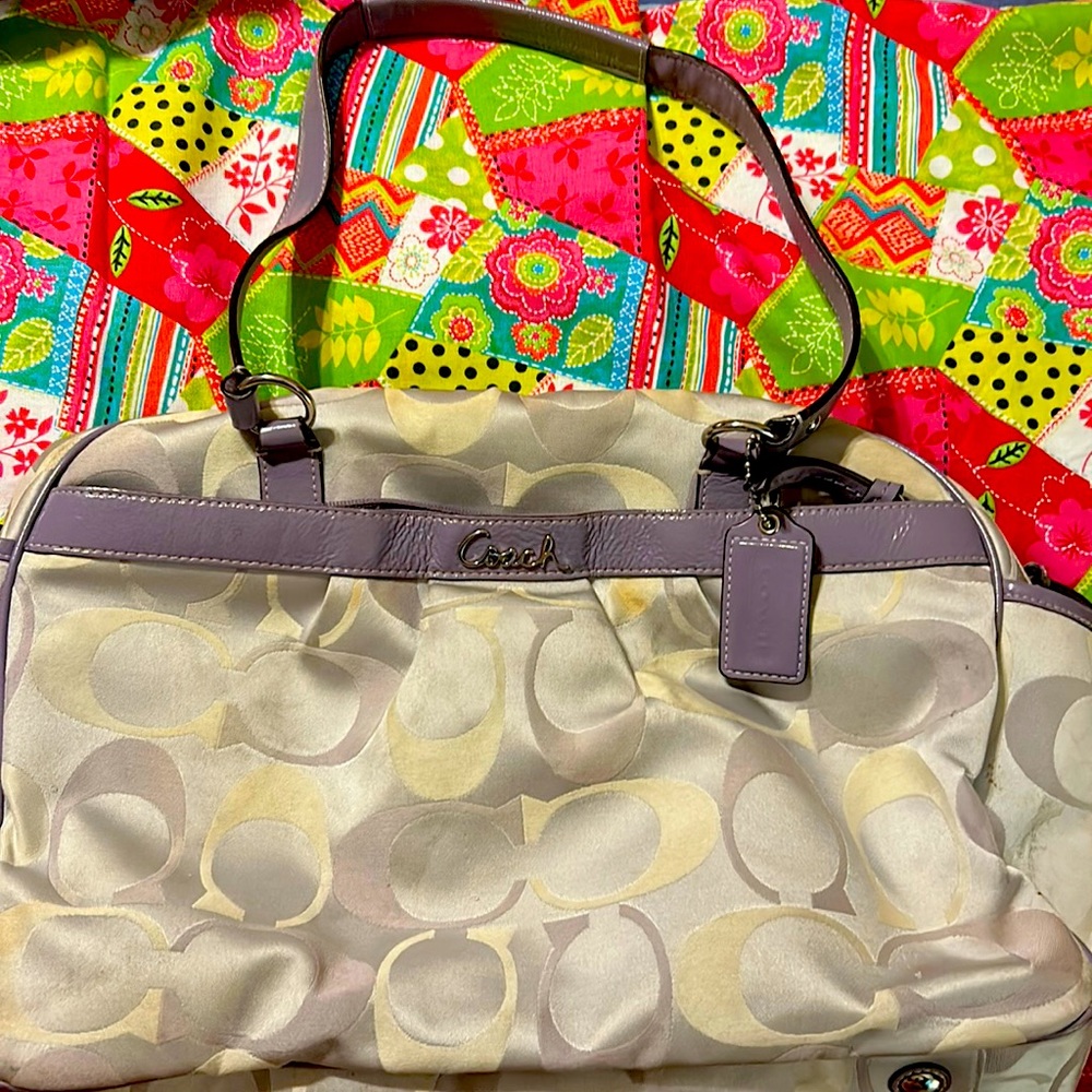 This authentic signature coach diaper bag